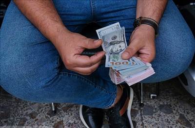رفع تعهد ارزی صادرکنندگان با فروش اسکناس ارز